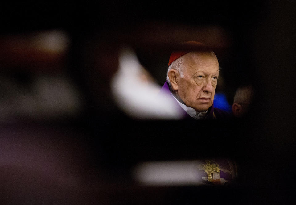 In this March 24, 2019 photo, former Archbishop of Santiago, Cardinal Ricardo Ezzati, takes part in a Mass at the Cathedral of Santiago, Chile, the day after Pope Francis replaced him as archbishop after he was placed under criminal investigation. Chilean sex abuse survivors have long accused Ezzati and his predecessor in Santiago, Cardinal Javier Errazuriz, of protecting predator priests and discrediting victims. Ezzati has denied covering up any cases. (AP Photo/Esteban Felix)