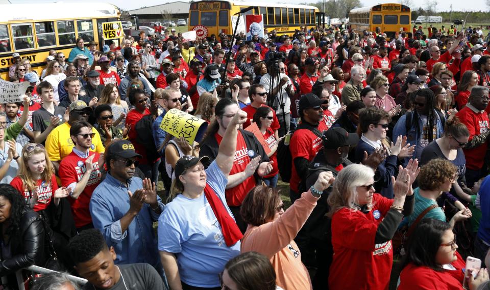 Several thousand participants gather at a pro-union rally near Nissan Motor Co.'s Canton, Miss., plant, Saturday, March 4, 2017, to listen to speeches from U.S. Sen. Bernie Sanders, I-Vt, actor Danny Glover, national NAACP President Cornell Brooks, U.S. Rep. Bennie Thompson, D-Miss., and UAW president Dennis Williams. Participants marched to the plant to deliver a letter to the company demanding the right to vote on union representation to address better wages, safe working conditions and job security. (AP Photo/Rogelio V. Solis)