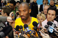 Lakers guard Kobe Bryant talks with reporters during Los Angeles Lakers Media Day at the Toyota Sports Center on December 11, 2011, in El Segundo, Calif.
