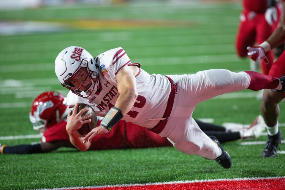 NMSU quarterback Diego Pavia scores a touchdown during the Isleta New Mexico Bowl on Saturday, Dec. 16, 2023, at the University Stadium in Albuquerque.