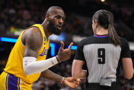 Los Angeles Lakers forward LeBron James (6) pleads with referee Natalie Sago (9) after being charged with a foul during the second half of an NBA basketball game against the Indiana Pacers in Indianapolis, Thursday, Feb. 2, 2023. The Lakers defeated the Pacers 112-111. (AP Photo/Michael Conroy)
