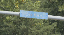 This Monday, July 26, 2021 photo shows a sign for Lee Highway in Fairfax County, Va. The names of Confederate leaders are being stripped from schools and major highways throughout Virginia. But when it comes to the many side streets in the state that carry Confederate names, it's a different story. (AP Photo/Dan Huff)