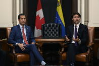 Canada's Prime Minister Justin Trudeau, right, and interim President of Venezuela Juan Guaido meet at Trudeau's Parliament Hill office in Ottawa, Ontario, Monday, Jan. 27, 2020. (Justin Tang/The Canadian Press via AP)