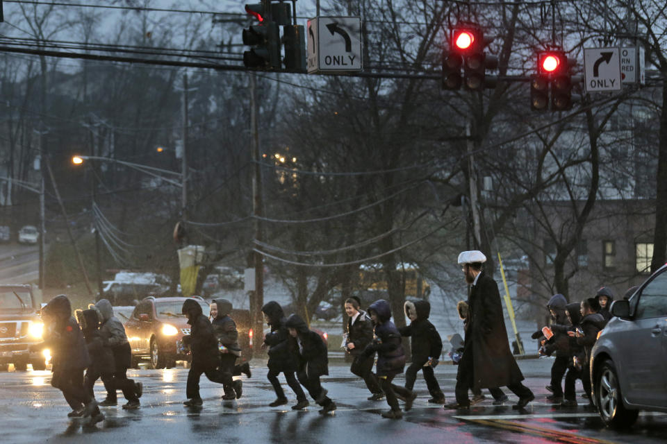 A group of orthodox jewish children cross the street in Monsey, N.Y., Monday, Dec. 30, 2019. (Photo: Seth Wenig/AP)