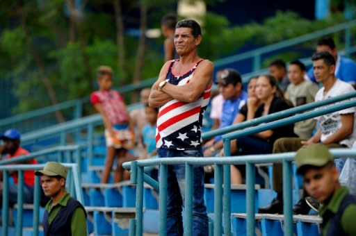 A man wearing a shirt depicting the US flag in Havana, on December 12, 2019