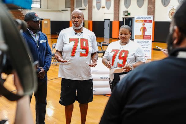 PHOTO: Marty and Tonya speaking to parents about heat stroke. (Courtesy The Jordan McNair Foundation)