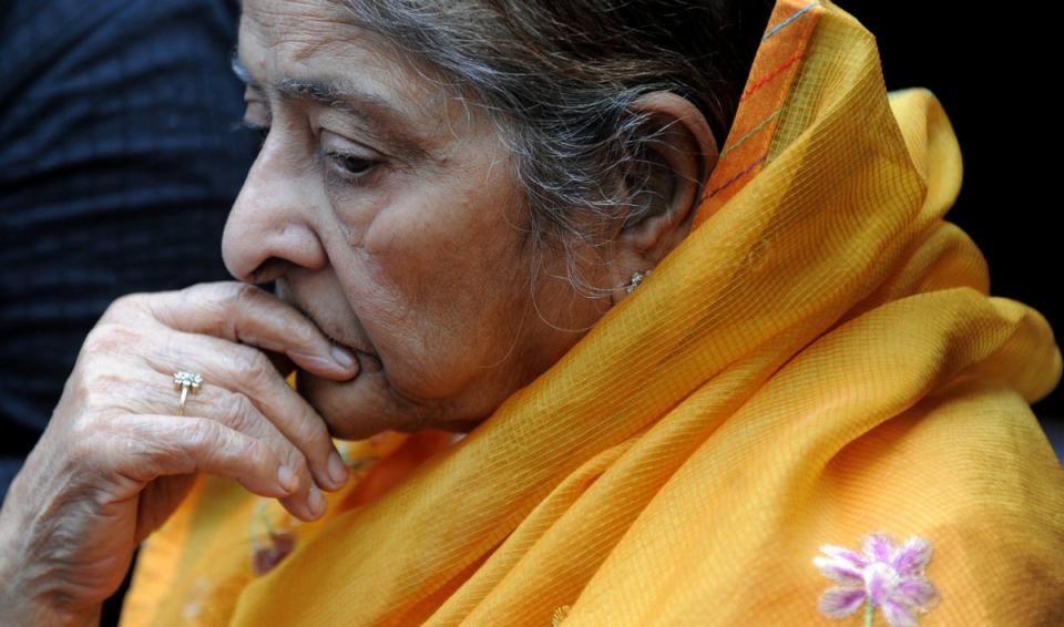 Indian widow Zakia Jafri looks on during a press interaction outside a court in Ahmedabad on 26 December 2013, following a judgement in favour of then-chief minister of Gujarat Narendra Modi over his role in the 2002 religious riots (AFP via Getty Images)