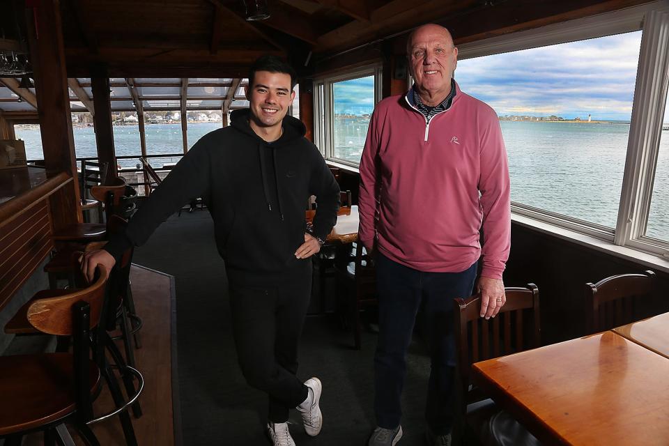 Bob Warner stands with Dan Groom-Traina, the new owner of the Mill Wharf Restaurant, on Wednesday, April 27, 2022.
