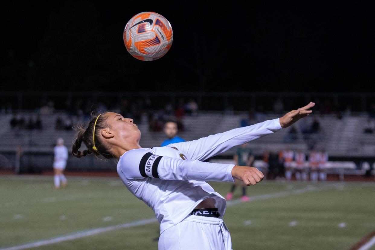 Watterson's Emily Copeland plays the ball during a game last October. The Eagles will move from Division I to Division II in 2024.