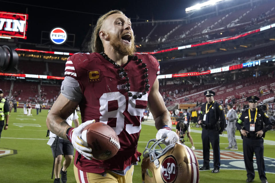 San Francisco 49ers tight end George Kittle (85) celebrates after the 49ers defeated the Dallas Cowboys in an NFL football game in Santa Clara, Calif., Sunday, Oct. 8, 2023. (AP Photo/Godofredo A. Vásquez)