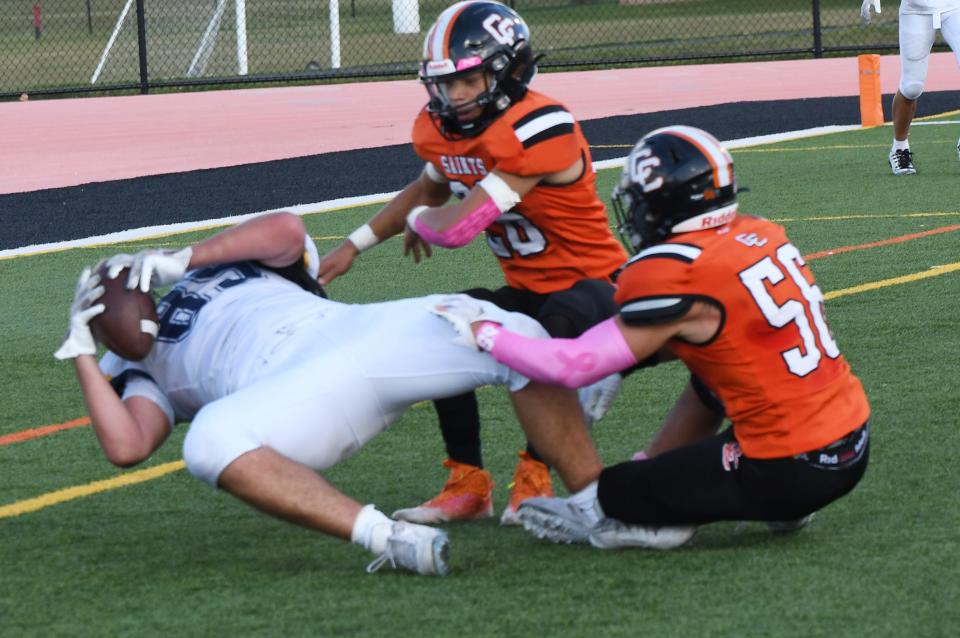 Victor tight end Nick Leonard catches the game-winning touchdown as the Blue Devils defeated host Churchville-Chili 20-19.