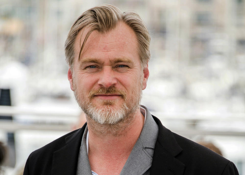 FILE - In this May 12, 2018, file photo, director Christopher Nolan poses during a photo call at the 71st international film festival in Cannes, southern France. Warner Bros. will release Nolan’s “Tenet” internationally first on Aug. 26, with a U.S. release in select cities to follow over Labor Day weekend. Warner Bros. (Photo by Arthur Mola/Invision/AP, File)