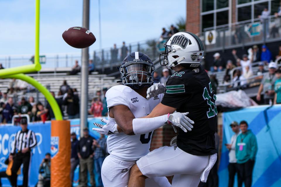 Dec 16, 2023; Conway, SC, USA; Georgia Southern Eagles defender disrupts a pass intended for Ohio Bobcats wide receiver Sam Wiglusz (12) in the first half at Brooks Stadium.