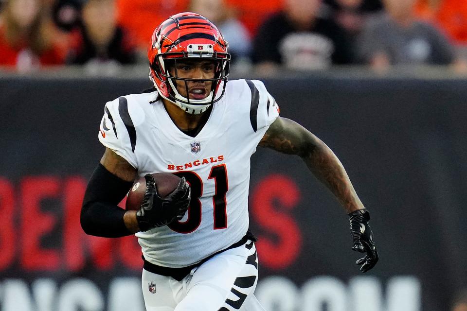 Aug 12, 2022; Cincinnati, Ohio, USA;  Cincinnati Bengals tight end Thaddeus Moss (81) runs with a catch in the first quarter of the NFL Preseason Week One game between the Cincinnati Bengals and Arizona Cardinals at Paycor Stadium. Mandatory Credit: Sam Greene-USA TODAY Sports