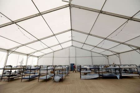 The interioir a refugee tent camp called 'The Tent' in Munich October 10, 2014. REUTERS/Michaela Rehle