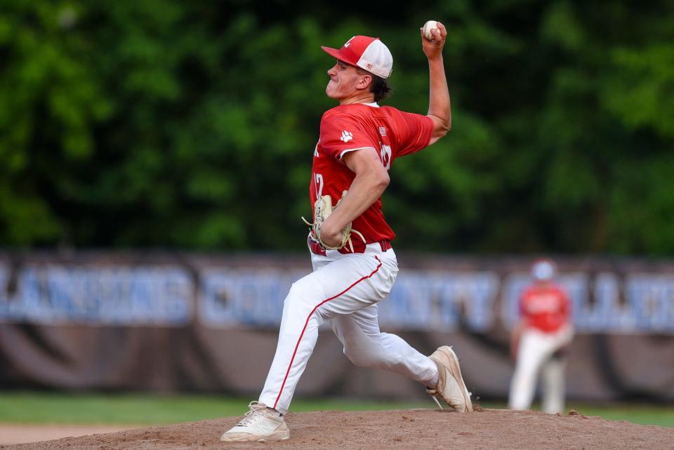 Laingsburg's Ty Randall pitches to a St. Johns batter during the third inning on Tuesday, May 23, 2023, at Kircher Municipal Park in Lansing.
