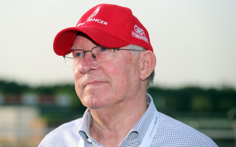 Portrait of Sir Alex Ferguson during morning trackwork at Meydan racecourse, Dubai