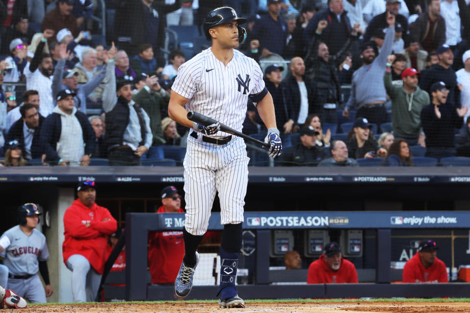 NEW YORK, NY - OCTOBER 18: Giancarlo Stanton #27 of the New York Yankees hits a three run home run in the first inning during the game between the Cleveland Guardians and the New York Yankees at Yankee Stadium on Tuesday, October 18, 2022 in New York, New York. (Photo by Mary DeCicco/MLB Photos via Getty Images)