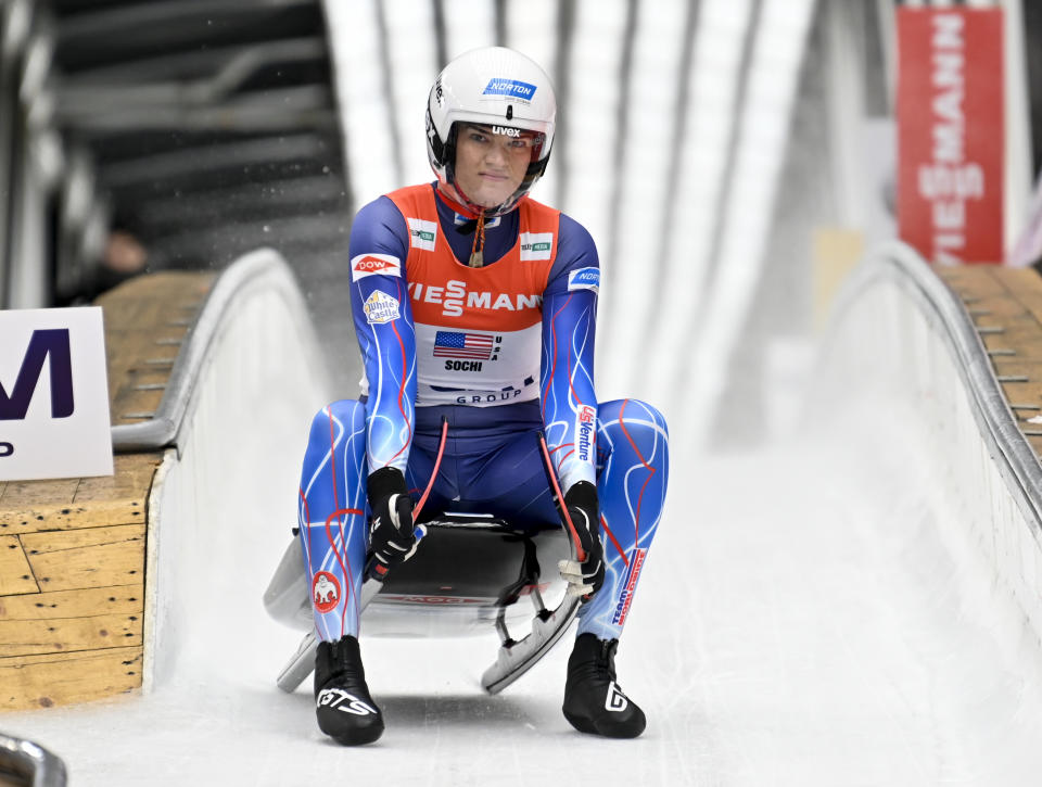 Summer Britcher of United States finishes her team relay race at the World Luge Championships in Krasnaya Polyana, near the Black Sea resort of Sochi, southern Russia, Sunday, Feb. 16, 2020. (AP Photo/Artur Lebedev)