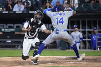 Chicago White Sox catcher Seby Zavala tags out Kansas City Royals' Edward Olivares at home during the third inning of a baseball game Tuesday, Aug. 3, 2021, in Chicago. (AP Photo/Charles Rex Arbogast)