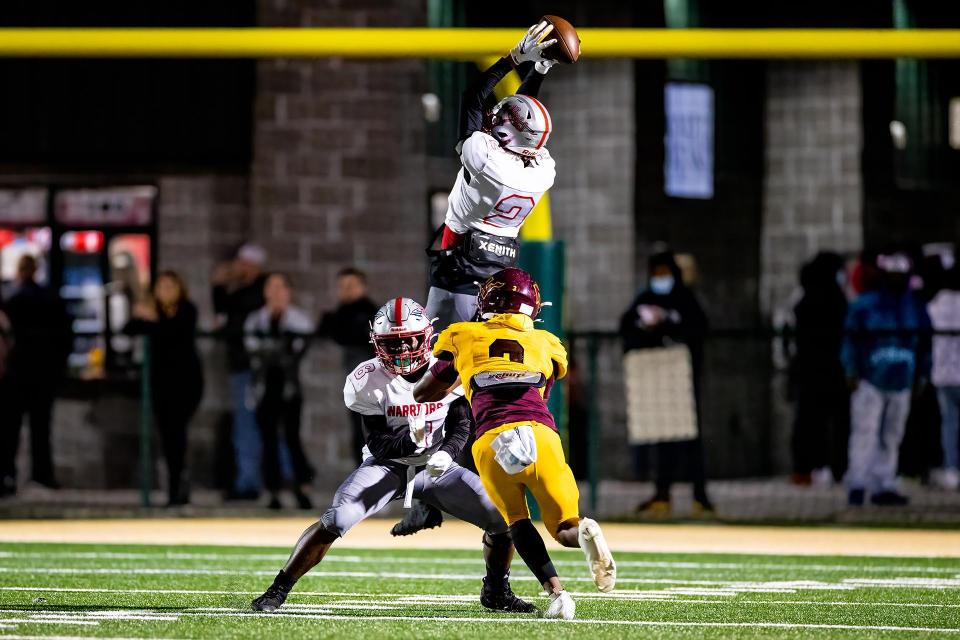 Jenkins Eugene "Tre" Brown gets up to catch a long pass during a game against New Hampstead on Oct. 29, 2021.