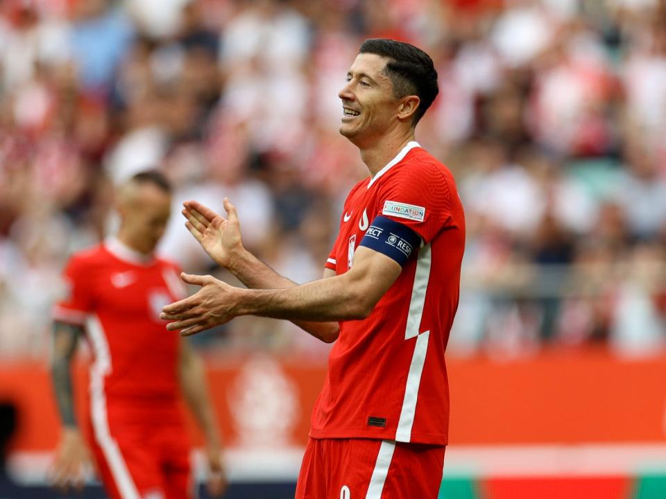 Poland's Robert Lewandowski claps during a match.