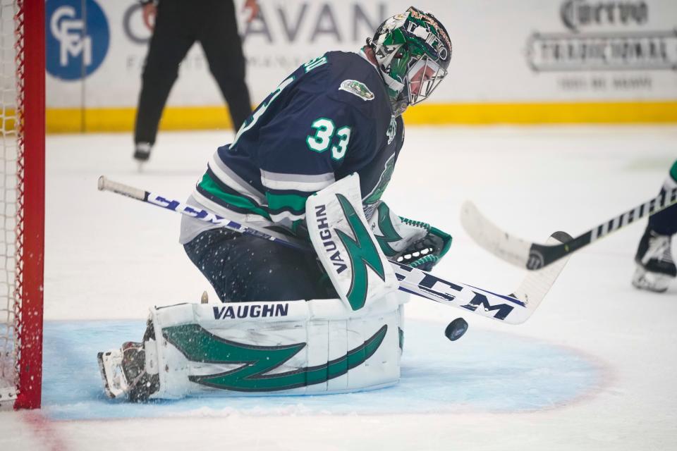 Florida Everblades goaltender Cam Johnson (33) blocks a shot from the Idaho Steelheads during the second period of game four of the ECHL Kelly Cup at Hertz Arena in Estero on Friday, June 9, 2023. The Everblades won 4-3 to sweep the series.