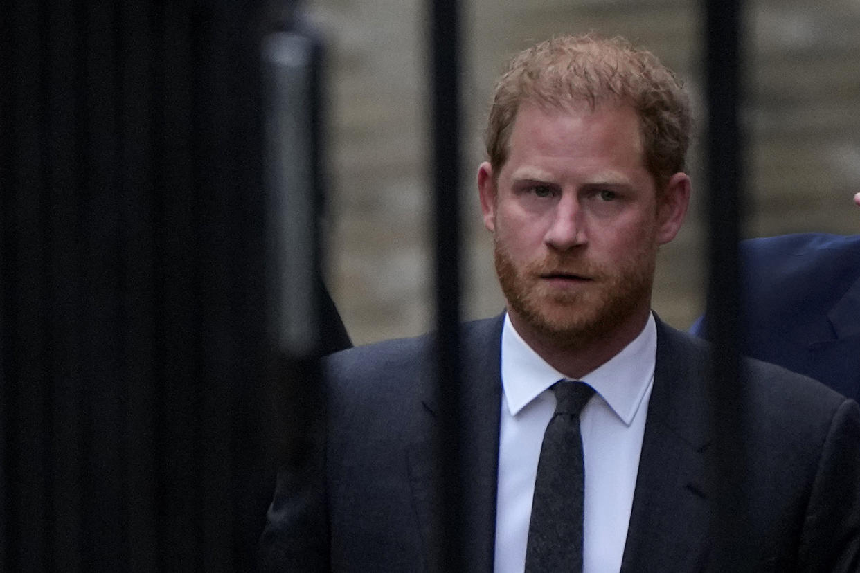 Britain's Prince Harry arrives at the Royal Courts Of Justice in London, Tuesday, March 28, 2023. Prince Harry is in a London court on Tuesday as the lawyer for a group of British tabloids prepared to ask a judge to toss out lawsuits by the prince, Elton John and several other celebrities who allege phone tapping and other invasions of privacy.(AP Photo/Alastair Grant)