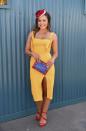 <p>Bringing a ray of sunshine to Flemington, Neighbours star Olympia Valance wore bright orange.</p>