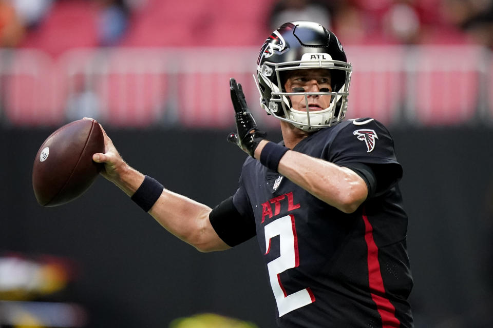 FILE - Atlanta Falcons quarterback Matt Ryan (2) warms up before the first half of a preseason NFL football game between the Atlanta Falcons and the Cleveland Browns, Aug. 29, 2021, in Atlanta. Ryan announces his retirement from the NFL on Monday, April 22, 2024. (AP Photo/Brynn Anderson, file)