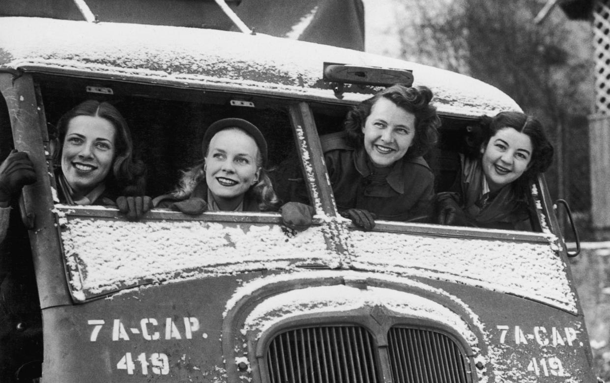 American Red Cross Clubmobile girls in a captured German vehicle in France during World War II