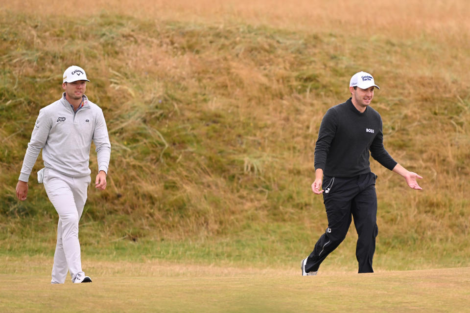 Sam Burns and Patrick Cantlay of the United States walk on the 4th hole during Day Two of The 150th Open at St Andrews Old Course on July 15, 2022, in St Andrews, Scotland. (Photo by Ross Kinnaird/Getty Images)