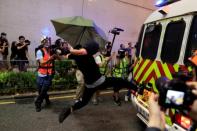 Protesters attend a demonstration in Hong Kong