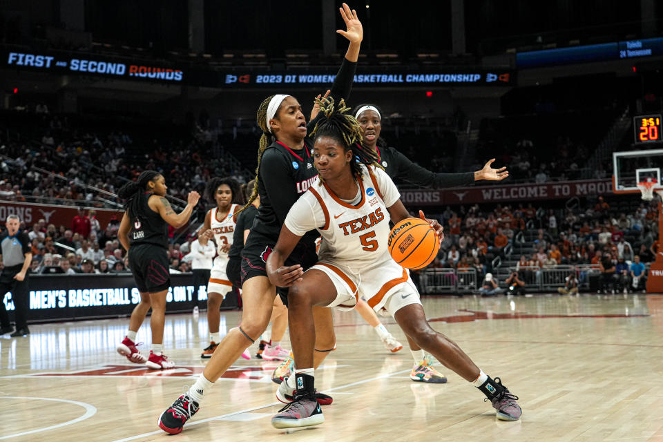 Texas forward DeYona Gaston, pushing past a Louisville defender during their NCAA Tournament game in March, made her 2023 season debut in Wednesday night's 106-62 win over Long Beach State. She finished with nine points and five rebounds in 14 minutes of play.