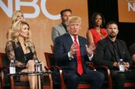 FILE PHOTO - Executive Producer and host Donald Trump (C) speaks about the NBC television show "The Celebrity Apprentice" during the TCA presentations in Pasadena, California, January 16, 2015. REUTERS/Lucy Nicholson
