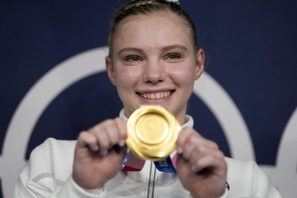 Jade Carey, of the United States, poses after winning the gold medal for the floor exercise during the artistic gymnastics women's apparatus final at the 2020 Summer Olympics, Monday, Aug. 2, 2021, in Tokyo, Japan. (AP Photo/Ashley Landis)