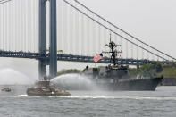 <p>The Arleigh Burke-class guided missile destroyer USS Bainbridge, from Norfolk, Va., sails under the Verrazano-Narrows Bridge in New York, Wednesday, May 25, 2016. The annual Fleet Week is bringing a flotilla of activities, including a parade of ships sailing up the Hudson River and docking around the city. The events continue through Memorial Day. (AP Photo/Richard Drew) </p>