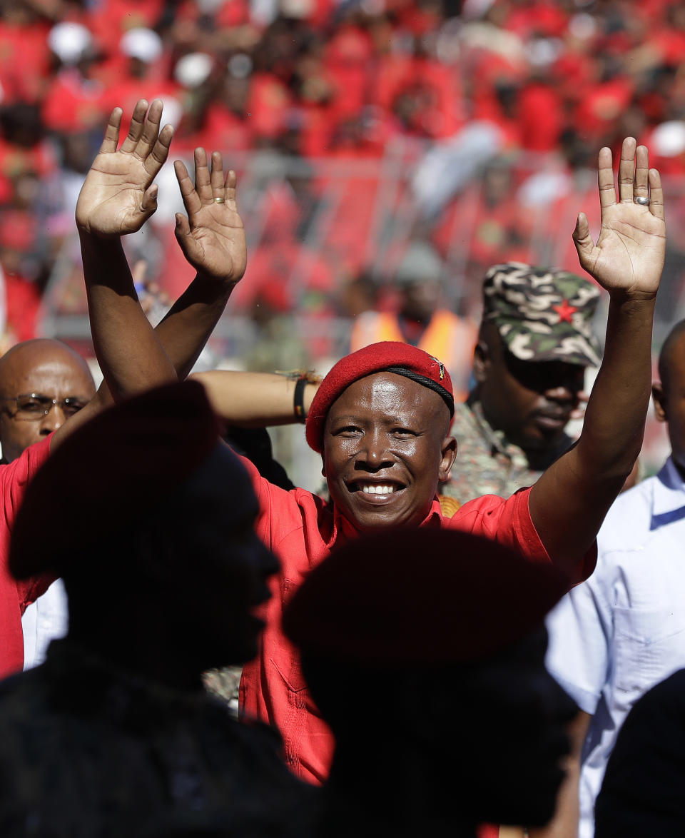 Leader of the Economic Freedom Fighters (EFF) party, Julius Malema, greets supporters as he arrives at Orlando Stadium in Soweto, South Africa, Sunday, May 5, 2019. Campaign rallies for South Africa’s upcoming election have reached a climax Sunday with mass rallies by the ruling party and one of its most potent challengers. (AP Photo/Themba Hadebe)