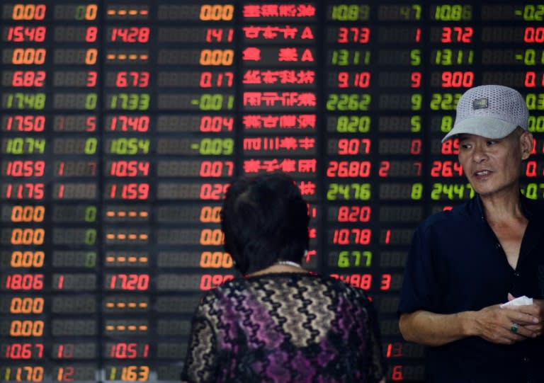 Shanghai investors took profits before the release of official manufacturing data, following last week’s volatile trading, dealers said