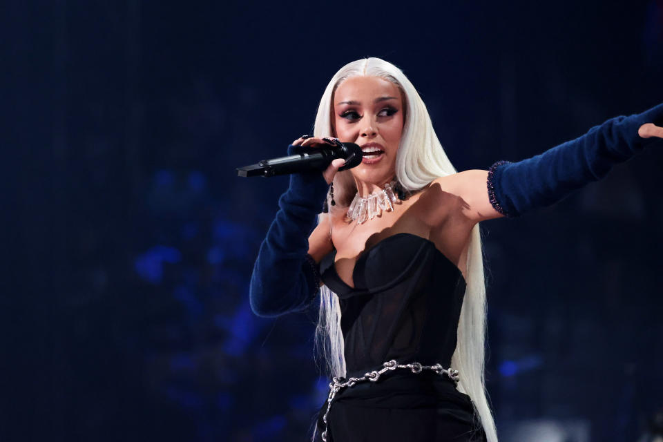 Doja Cat speaks onstage during the 2021 MTV Video Music Awards at Barclays Center on Sept. 12, 2021, in Brooklyn, N.Y. - Credit: Mike Coppola/Getty Images for MTV/ViacomCBS