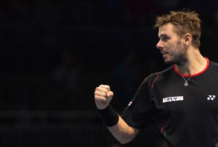 Stanislas Wawrinka of Switzerland reacts during his ATP World Tour Finals tennis men's singles match victory over Tomas Berdych of the Czech Republic at the O2 Arena in London, November 4, 2013. REUTERS/Toby Melville