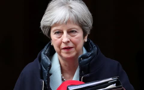  Theresa May leaves 10 Downing Street  - Credit: Hannah McKay/Reuters