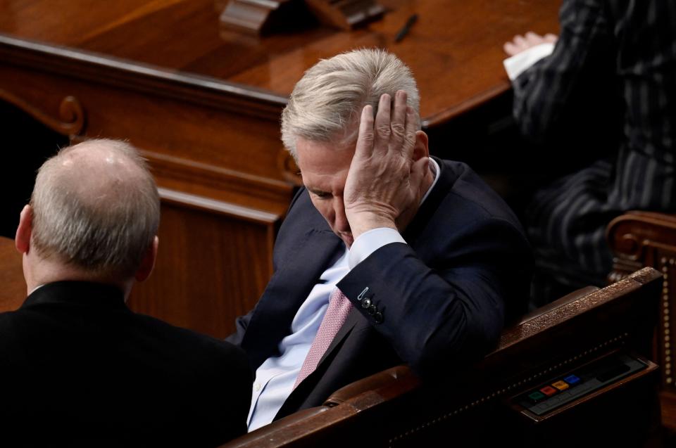 US Republican Representative of California Kevin McCarthy listens as lawmakers take a 13th vote for House Speaker at the US Capitol in Washington, DC, on January 6, 2023.