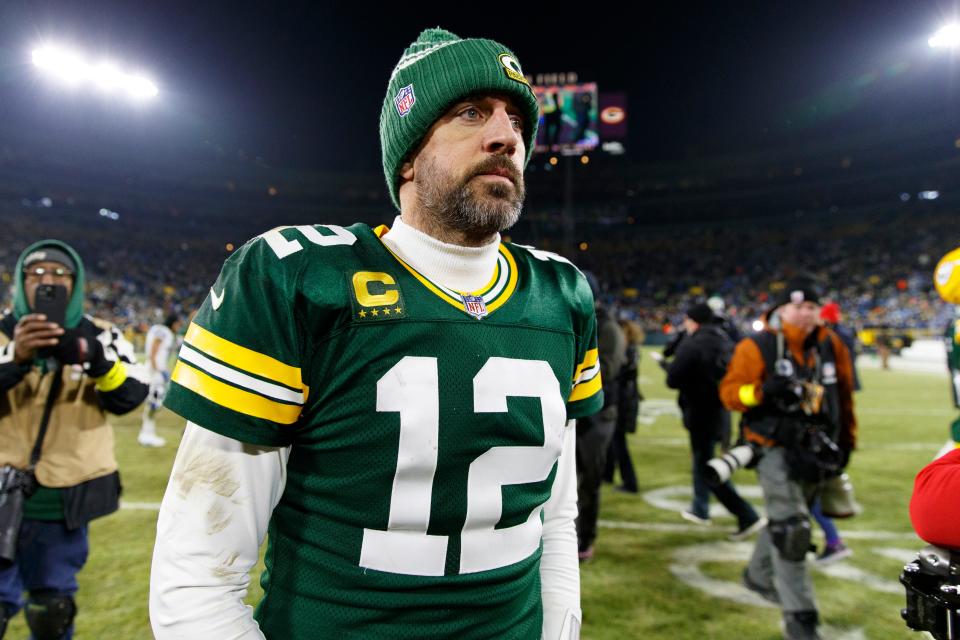 Jan 8, 2023; Green Bay, Wisconsin, USA;  Green Bay Packers quarterback Aaron Rodgers (12) walks off the field following the game against the Detroit Lions at Lambeau Field.