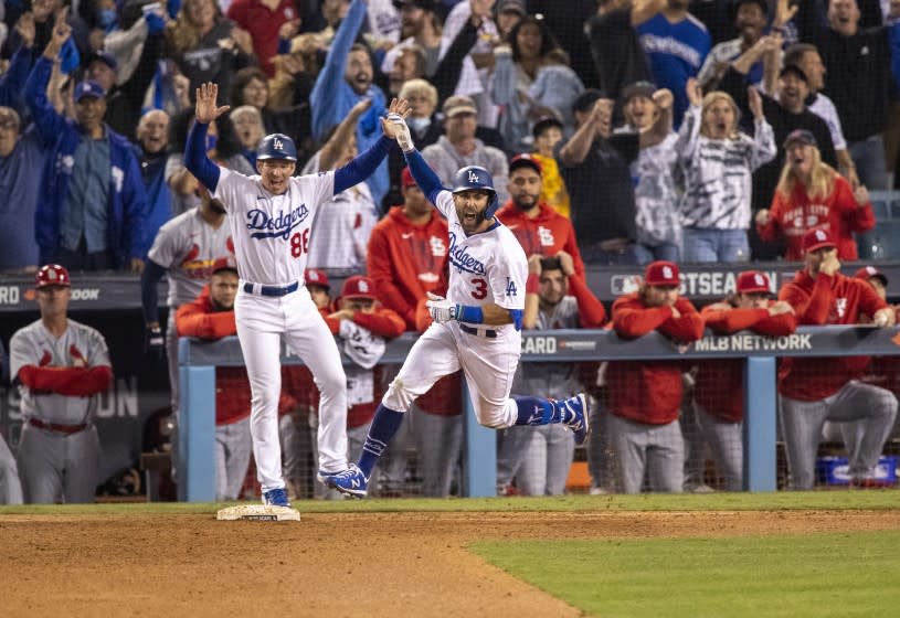 LOS ANGELES, CA - OCTOBER 6, 2021: Los Angeles Dodgers left fielder Chris Taylor (3) reacts while running the bases after his 2-run homer wins the game against the St Louis Cardinals in the National League Wild Card game at Dodger Stadium on October 6, 2021 in Los Angeles, California.(Gina Ferazzi / Los Angeles Times)