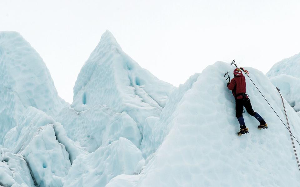 Tim Emmett climbing in the Yukon