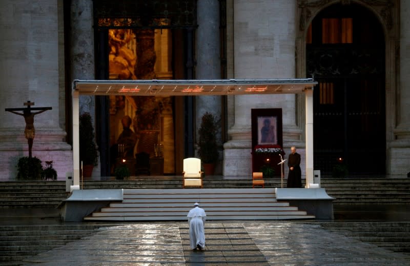 Pope Francis delivers an extraordinary blessing from St. Peter's Square during the outbreak of coronavirus disease (COVID-19), at the Vatican