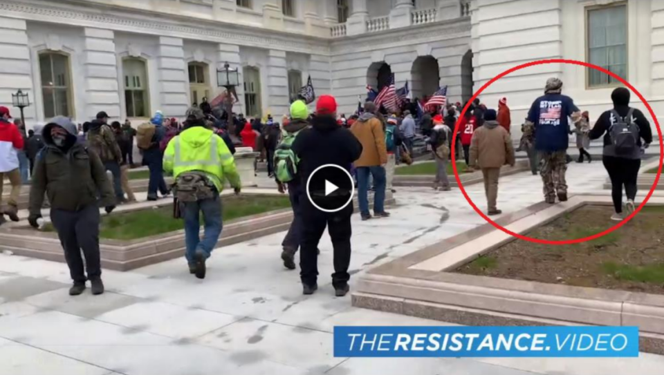 Federal prosecutors say Virginia Spencer, right, wore a jacket with an anti-gun control message as she and husband Chris (left in circle) took a “voluntary stroll” to the Senate wing door of the U.S. Capitol on Jan. 6, 2021.