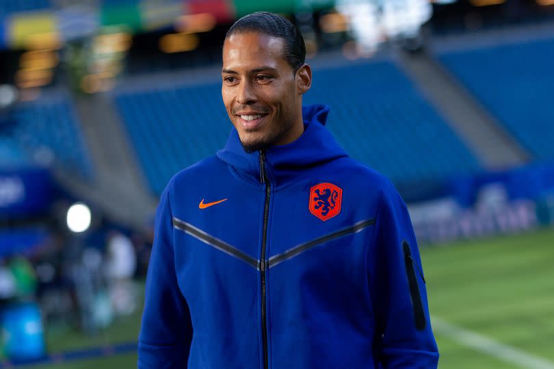 HAMBURG, GERMANY - JUNE 15:  Virgil van Dijk of the Netherlands inspects the pitch at Volksparkstadion on June 15, 2024 in Hamburg, Germany.