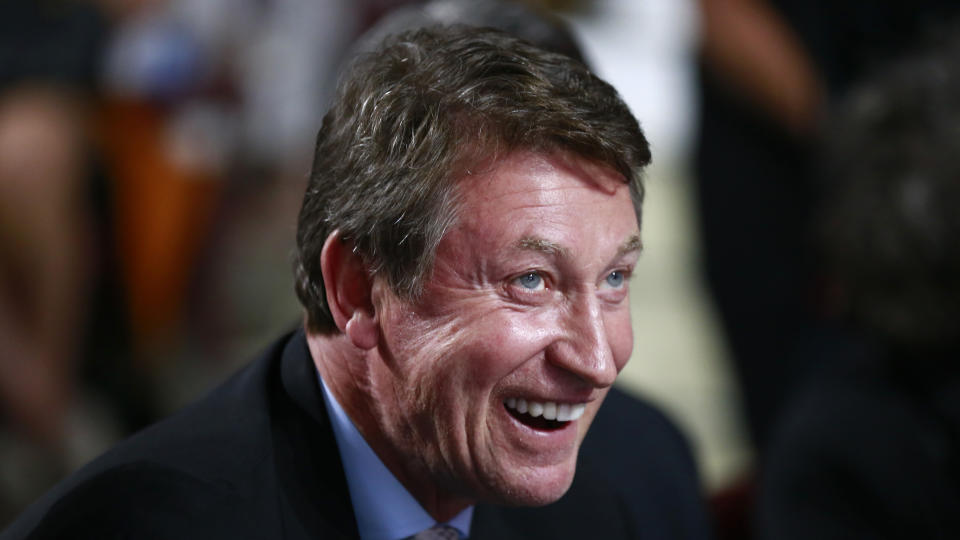 VANCOUVER, BRITISH COLUMBIA - JUNE 21: Former NHL player Wayne Gretzky of the Edmonton Oilers looks on from the draft table during the first round of the 2019 NHL Draft at Rogers Arena on June 21, 2019 in Vancouver, Canada. (Photo by Jeff Vinnick/NHLI via Getty Images)